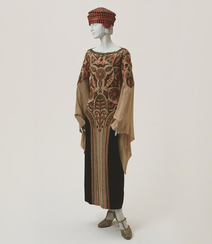 Dress and hat ensemble, 1923, Paul Poiret, Silk crepe de chine and velvet (dress), Silk satin and tulle with leather appliqué (hat), French. Philadelphia Museum of Art.